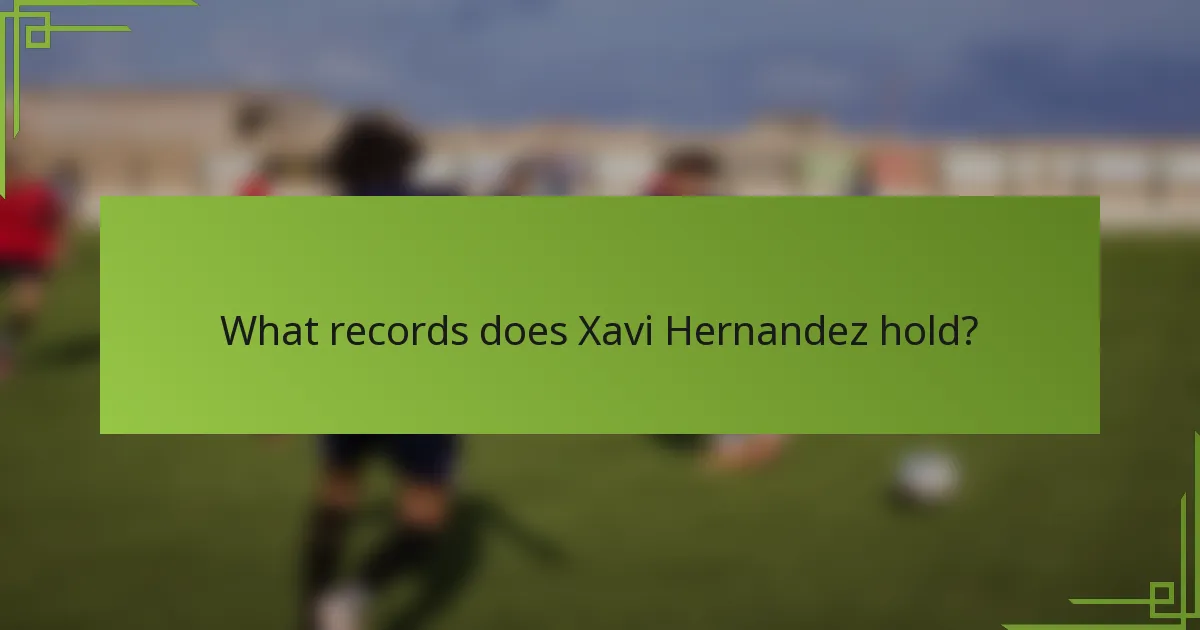 What records does Xavi Hernandez hold?
